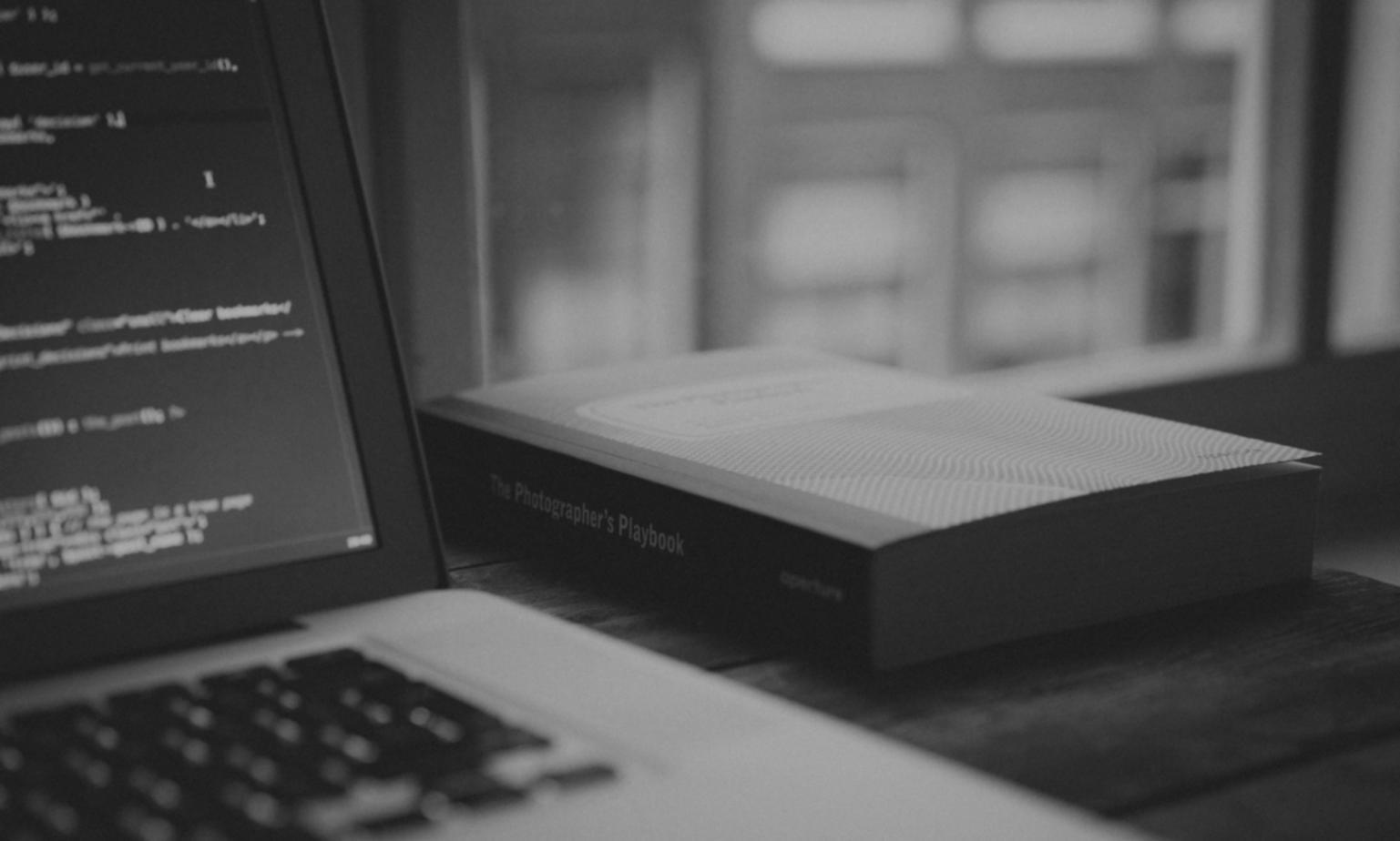 Students collaborating on front-end development projects in modern learning environment